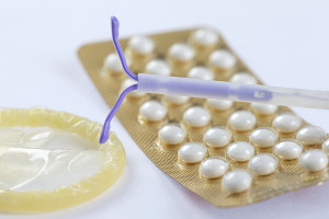 Birth Control symbole- IUD and contraceptive Pills and Condom