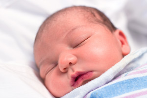 Newborn baby sleeping in hospital