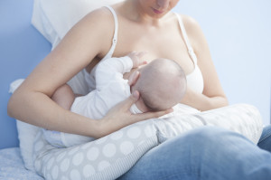 Mother breastfeeding her child